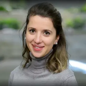 Woman feeling balanced and comfortable while supporting digestive wellness naturally